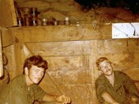 Inside Bunker on Green Line Jerry Joe Allen (L), KIA 6-19-70 Cambodia and Johnny Badmouth Edwards in Bunker on Green Line. Quan Loi Base Camp JGiffin Photo